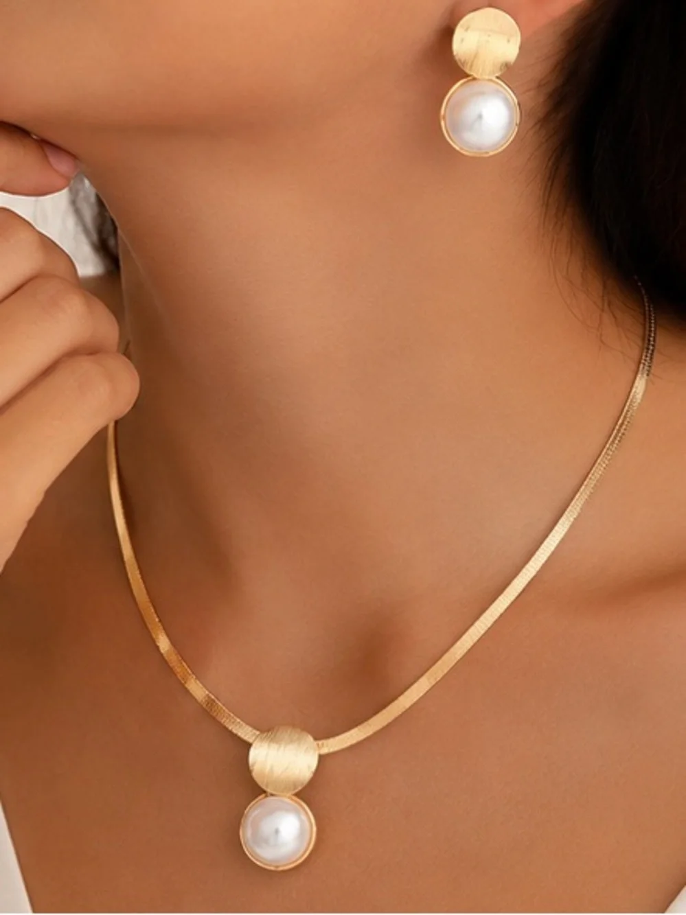 Anthropologie gold tone